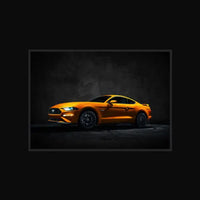 Orange sports car on a dark background