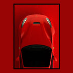 Red Ferrari 458 Italia car poster in a GlowFrame, top view on red background